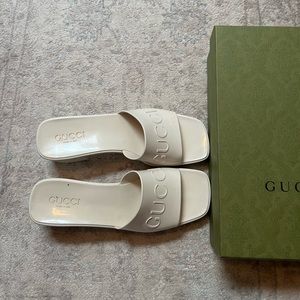 Gucci white rubber slide sandals
